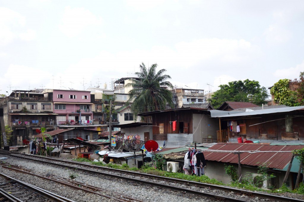 The Scenery Changes From Lush Greenery To Urban Jungle. Chumphon To Bangkok Train