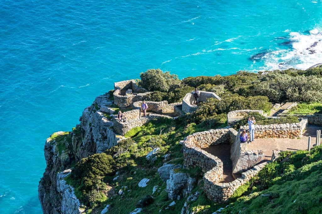 Alesha On A Mountain With Blue Ocean In Background Day Trips From Cape Town