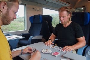 Ginski And Nick Playing Cards On The Train From Bari To Naples. Train Travel In Europe.