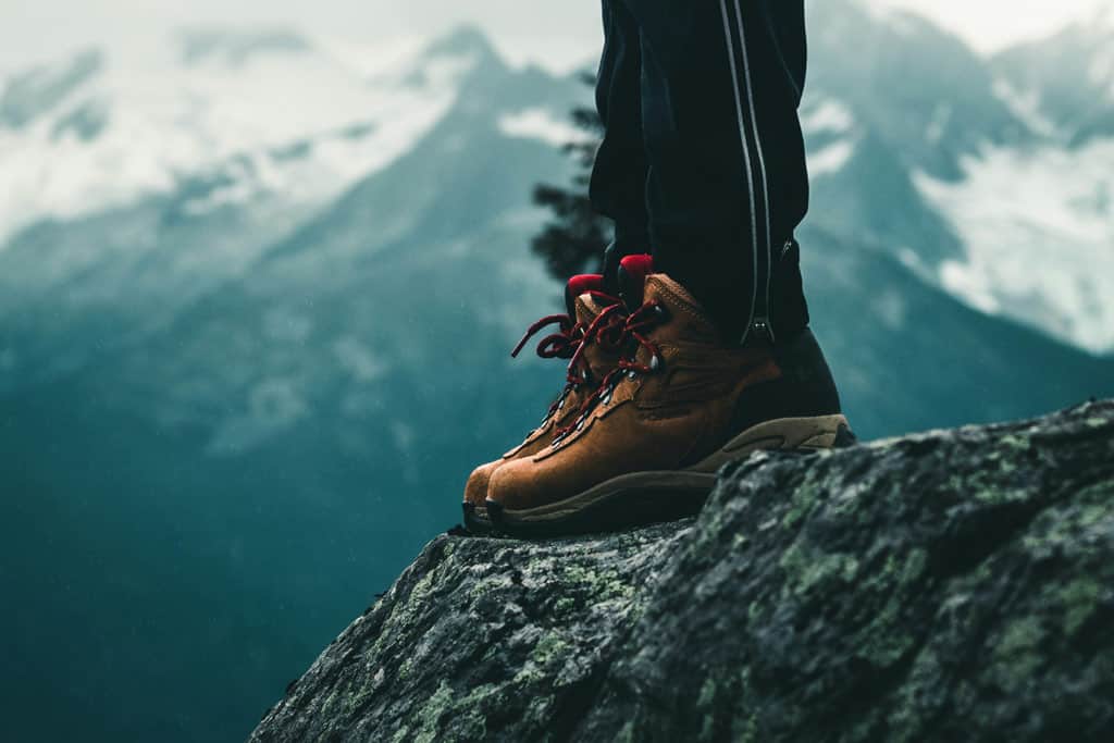 Person In Hiking Boots On A Steep Mountain