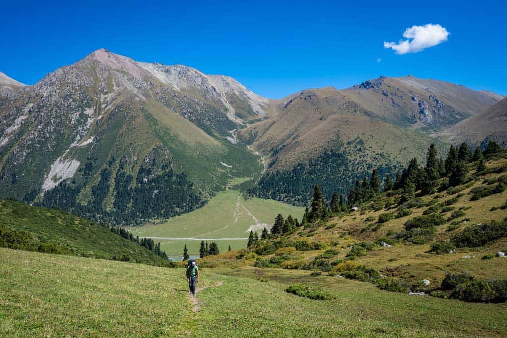 Hiker Walking Up Hill