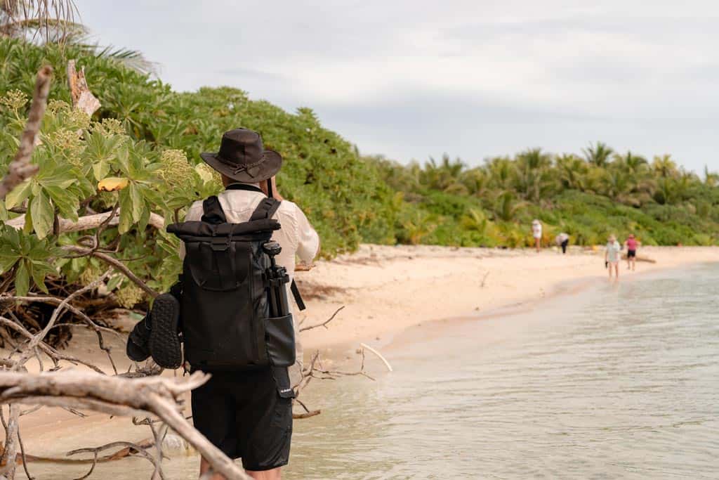 People Walking On The Beach