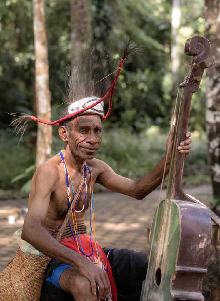 Moi Tribe Man Playing Music